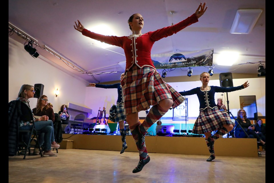 Gillie Callum Highland Dancer's perform a traditional Highland dance at the Tartan Day pub night hosted by the Three Sisters Scottish festival society at the Canmore Miners' Union Hall on Saturday (April 8). From Left: Evelyn Smith, Kate Spence and Sophie Grant. JUNGMIN HAM RMO PHOTO