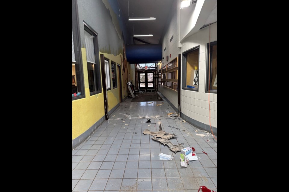 A car crashed through the east entrance of Mînî Thnî Community School April 12, causing an estimated $150,000 in damages. RCMP have apprehended a male suspect whose name will not be released until information is sworn.

RCMP PHOTO