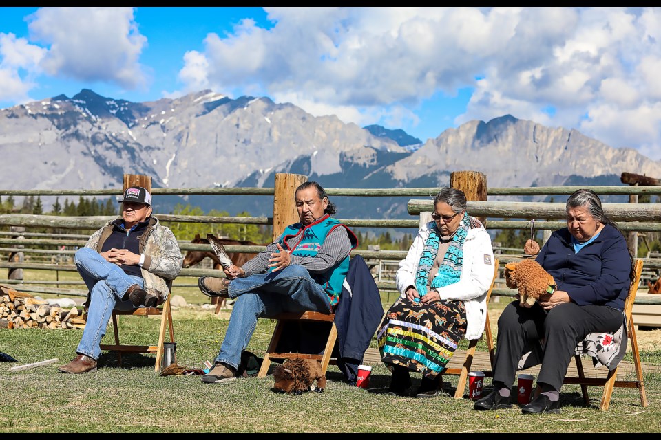 Îyârhe (Stoney) Nakoda First Nation elders spoke to Exshaw School and Lawrence Grassi Middle School students about cultural and ecological significance of bison at Star 6 Ranch near Exshaw on Thursday (May 11). From left: Ollie Benjamin, Virgil Stephens, Tracey Stevens and Philomene Stevens. JUNGMIN HAM RMO PHOTO