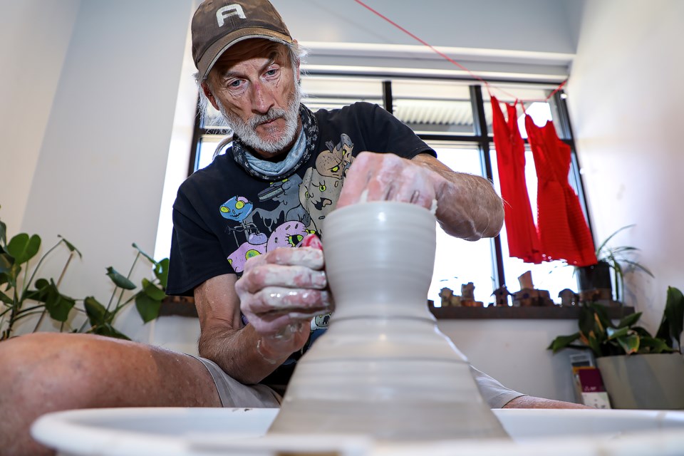 Joe Martin demonstrates the making of pottery at Pottery Palooza at artsPlace in Canmore on Saturday (May 13). Pottery Palooza 2023 offers family friendly clay playtime and artsPlace students' ceramic art sales. JUNGMIN HAM RMO PHOTO 