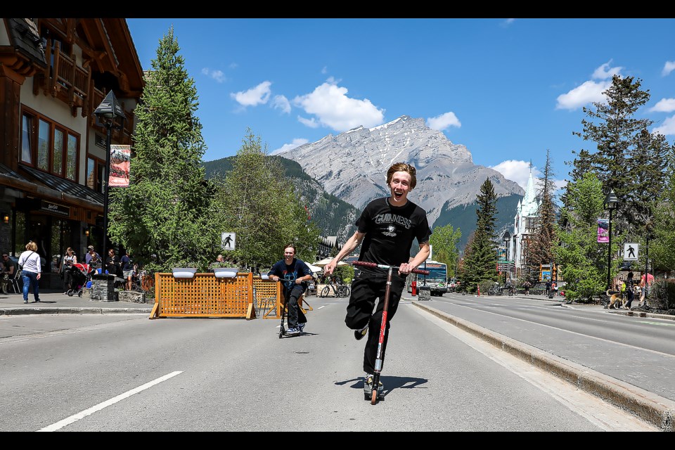 Cletus Kaliciak, right, and Aidan Spate from Switzerland scream and ride bri whip in the pedestrian zone at Banff Avenue on Friday (May 19). Banff Avenue and parts of Caribou street will be a pedestrian zone until October 13. JUNGMIN HAM RMO PHOTO 