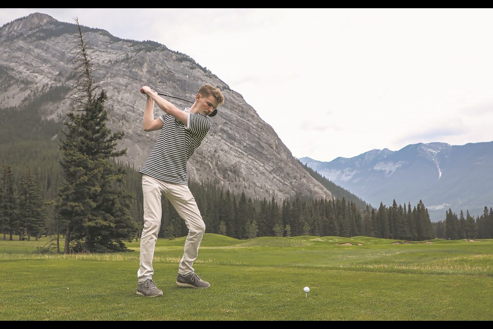 Calgary's Callaghan Stark tees off at the David Bayne Commemorative Golf Tournament at Fairmont Banff Springs Golf Course on Thursday (May 25). JUNGMIN HAM RMO PHOTO