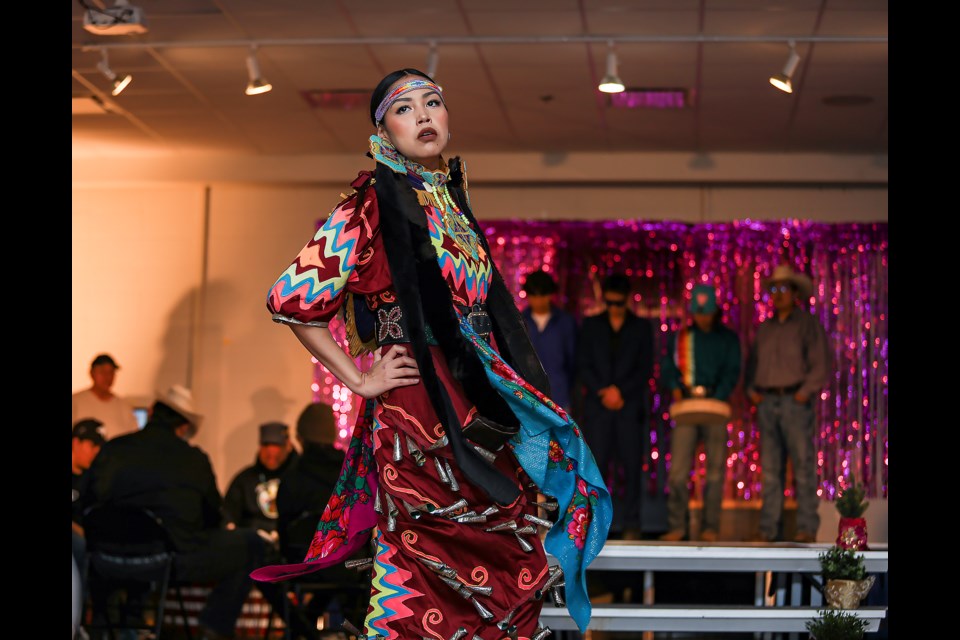 Zade Eagleplume performs a jingle dance during the powwow academy fashion show at Mînî Thnî Community School on Thursday (June 1). JUNGMIN HAM RMO PHOTO