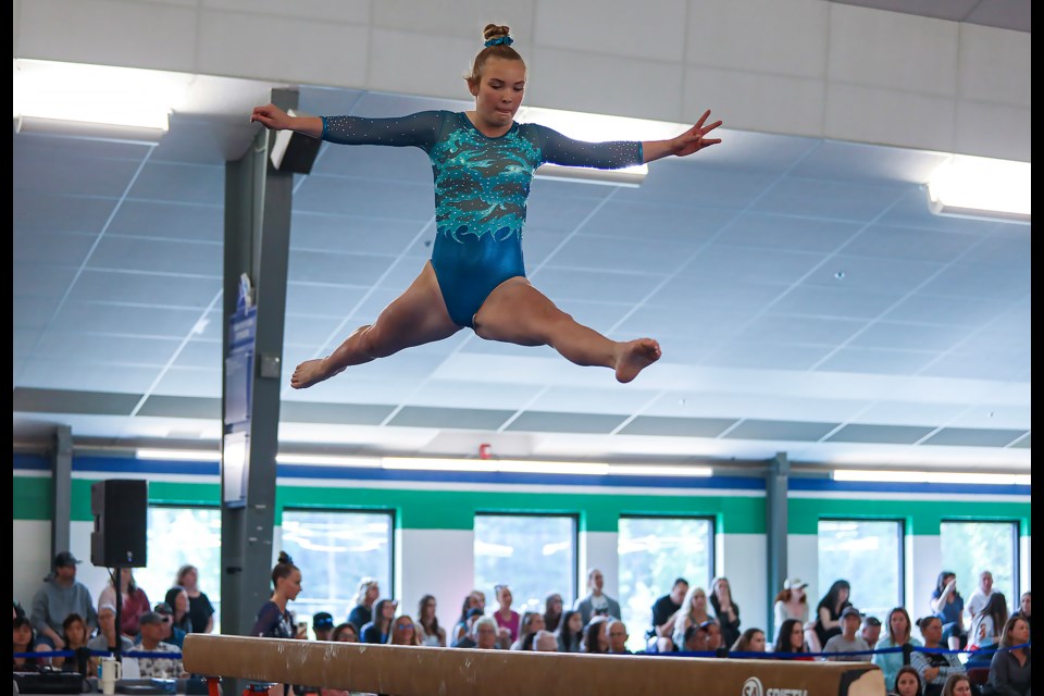 Canmore Illusions Gymnastics Club's Nellie Tresidder competes on balance beam at the 2023 Summit Invitational at the Canmore Recreation Centre on Friday (June 2). JUNGMIN HAM RMO PHOTO