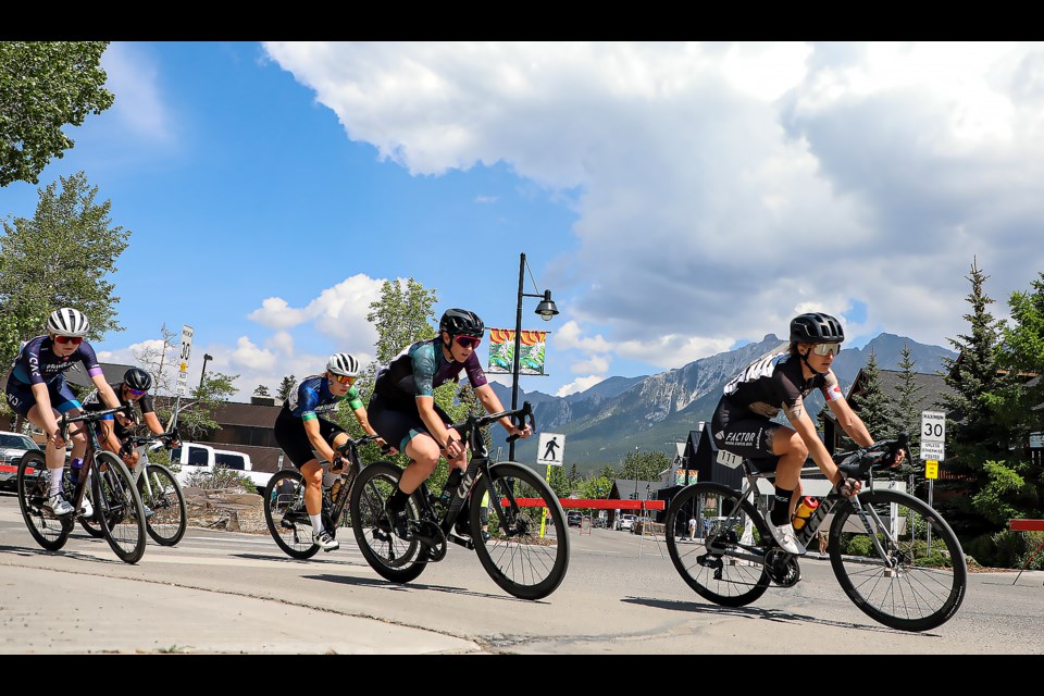 Canadian cycle Olympian Leah Kirchmann, right, and Canadian speed skate Olympian Ivanie Blondin race up in the women's 1/2/3 CAT at the Rundle Mountain Road Festival in Canmore on Saturday (June 3). JUNGMIN HAM RMO PHOTO

