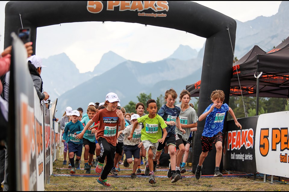 Kids race out of the gate during the 3km kids trail race at the 2023 5 Peaks Trail Running Series Canmore No. 1 at Canmore Nordic Centre on Saturday (June 10). JUNGMIN HAM RMO PHOTO