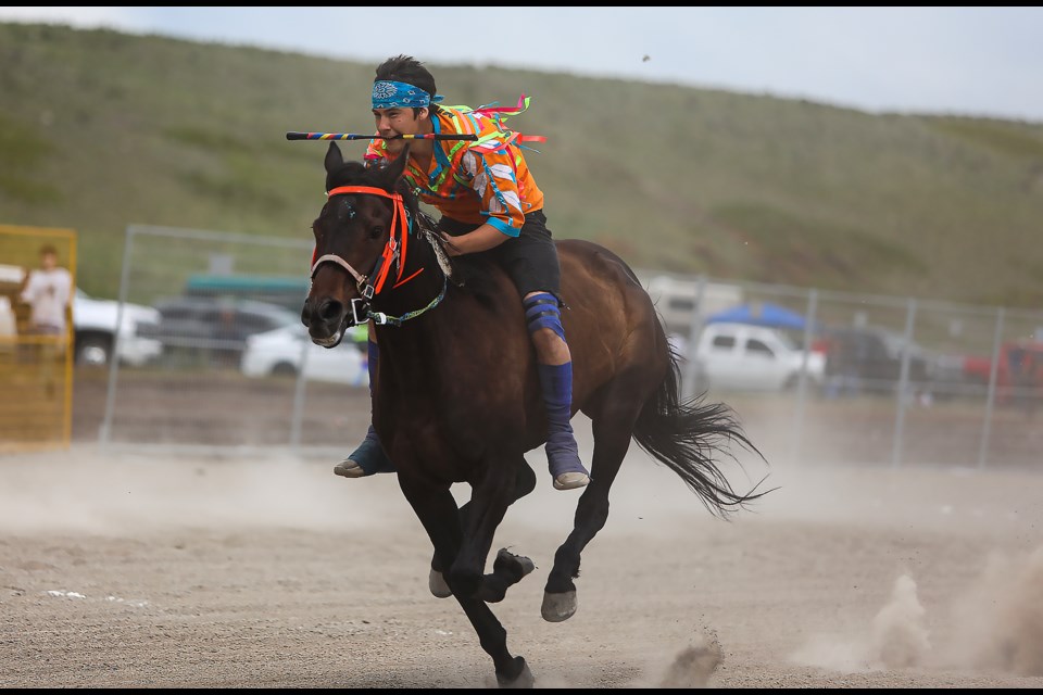 Nakoda Warriors Indian Relay team's rider Zane Jackson races  a horse bareback during the inaugural Mînî Thnî Relay Race at the new horse track built near the Chief Goodstoney Rodeo Centre in Îyârhe Nakoda First Nation in July.

JUNGMIN HAM RMO PHOTO