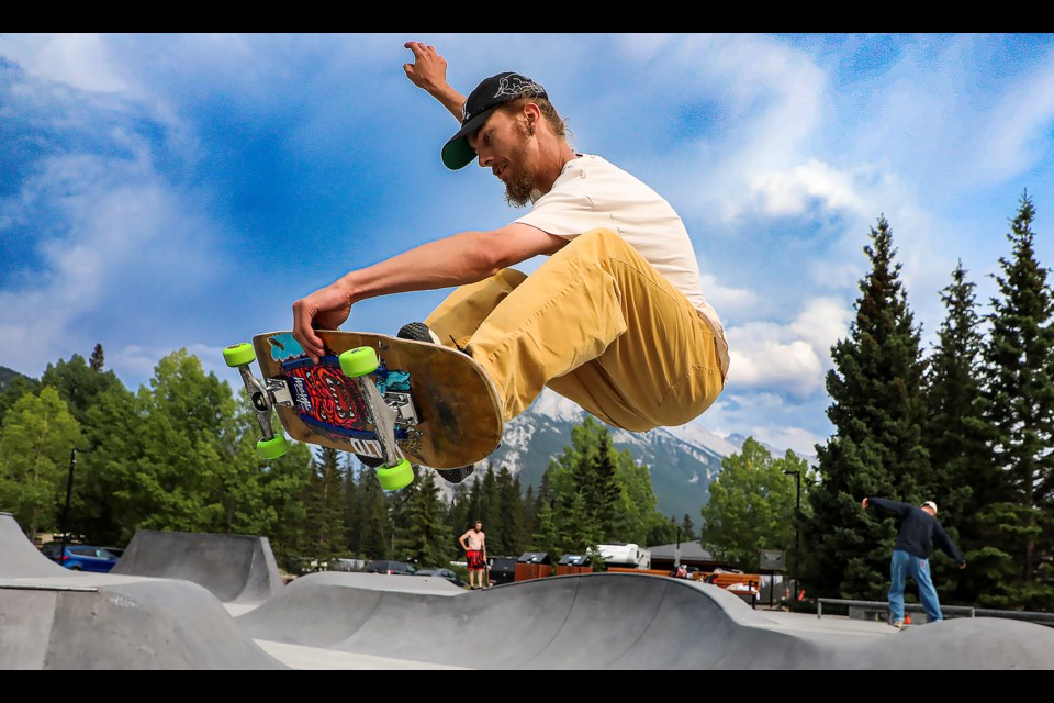 Banff skateboarder Dylan Skalicky catches air off the lip of the bowl during the skatepark community bbq in Banff on Thursday (July 6). JUNGMIN HAM RMO PHOTO