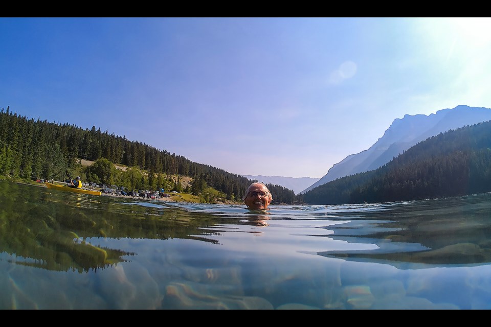 Karen Clemmensen from Denmark enjoys the summer by swimming in Two Jack Lake in Banff National Park on Saturday (July 8). JUNGMIN HAM RMO PHOTO