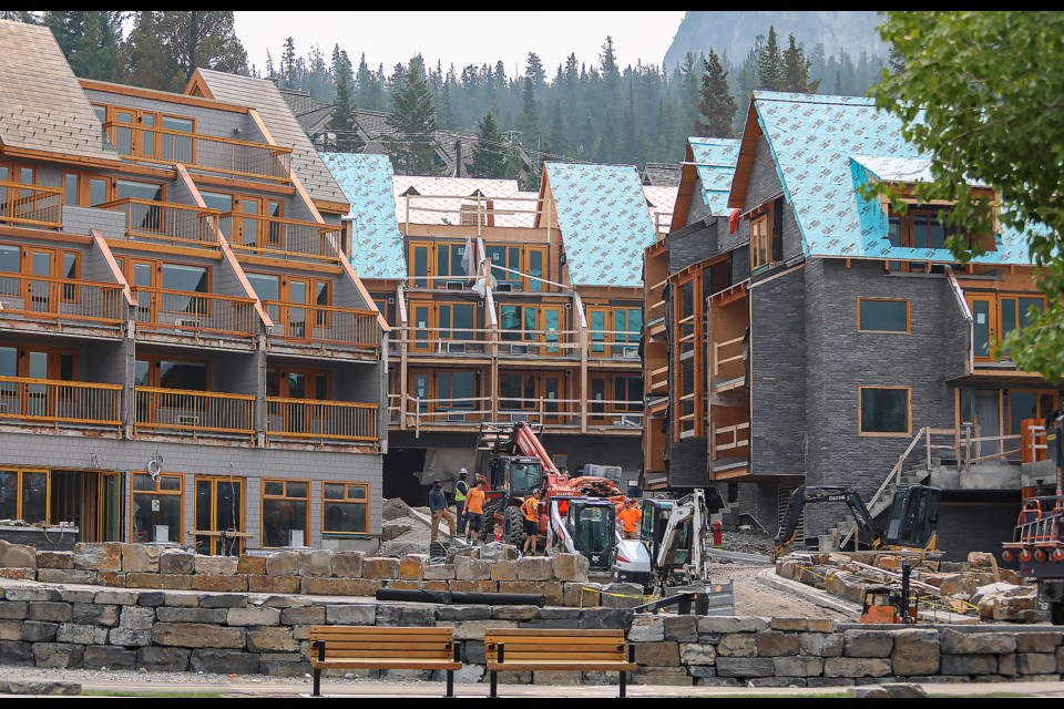 Construction crews work at 600 Banff Avenue at the former Inns of Banff on Friday (July 14). JUNGMIN HAM RMO PHOTO