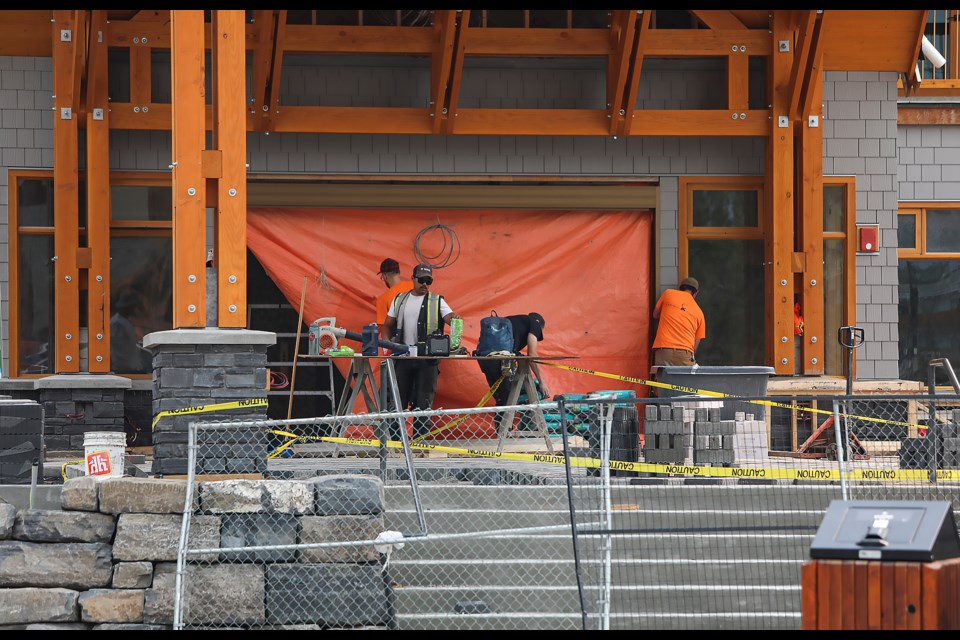 Construction crews working at 600 Banff Avenue at the former Inns of Banff on Friday (July 14). JUNGMIN HAM RMO PHOTO