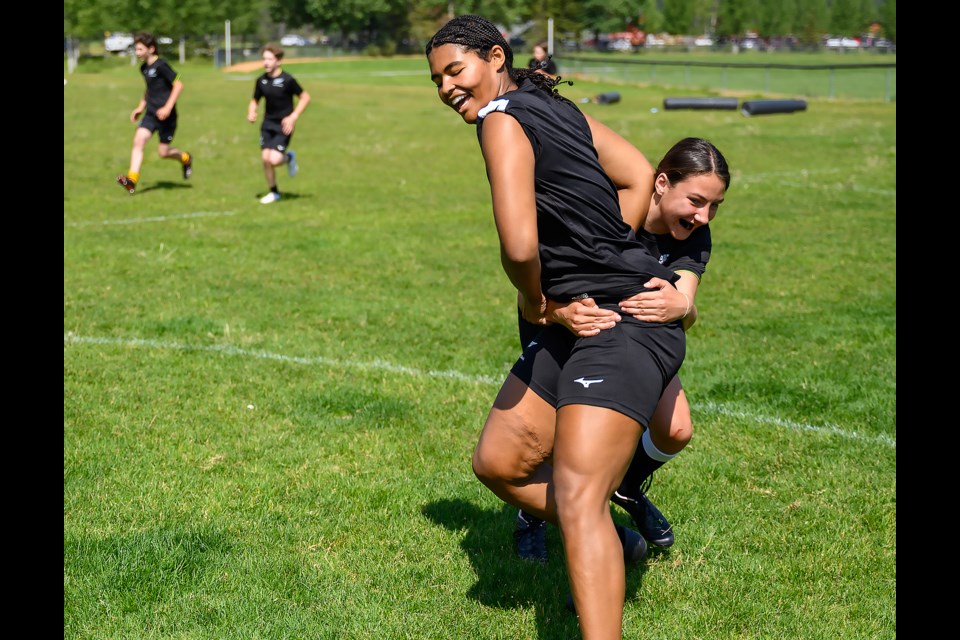 Participants in a rugby camp hosted by Haka Rugby Global practice tackling in Banff on Thursday (July 20). Haka Rugby Global tours around the globe teaching kids rugby as well as Maori culture. MATTHEW THOMPSON RMO PHOTO