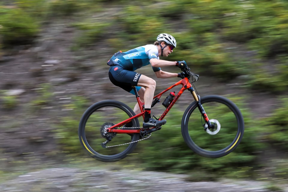 Jared Gervais flies down the track while cycling during the 2023 RMCC Mountain Bike Festival provincial XCO championships on Friday (Aug. 11) at the Canmore Nordic Centre. JUNGMIN HAM RMO PHOTO