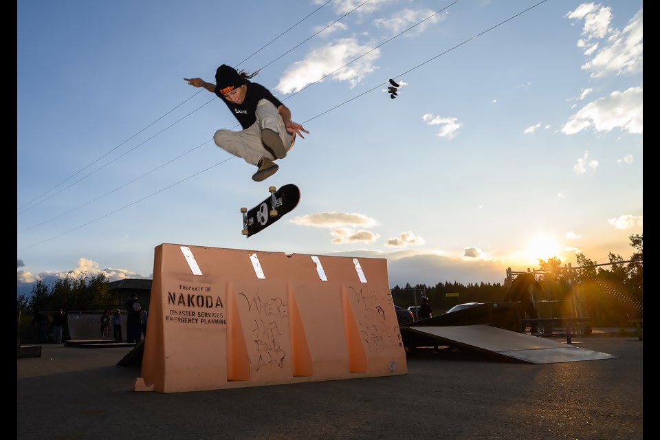 River Holloway kickflips a barrier in Mînî Thnî for Cousins Skateboarding weekly skate session on Wednesday (Aug. 23). Cousins Skateboarding is a nonprofit that aims to empower Indigenous skate communities. MATTHEW THOMPSON RMO PHOTO