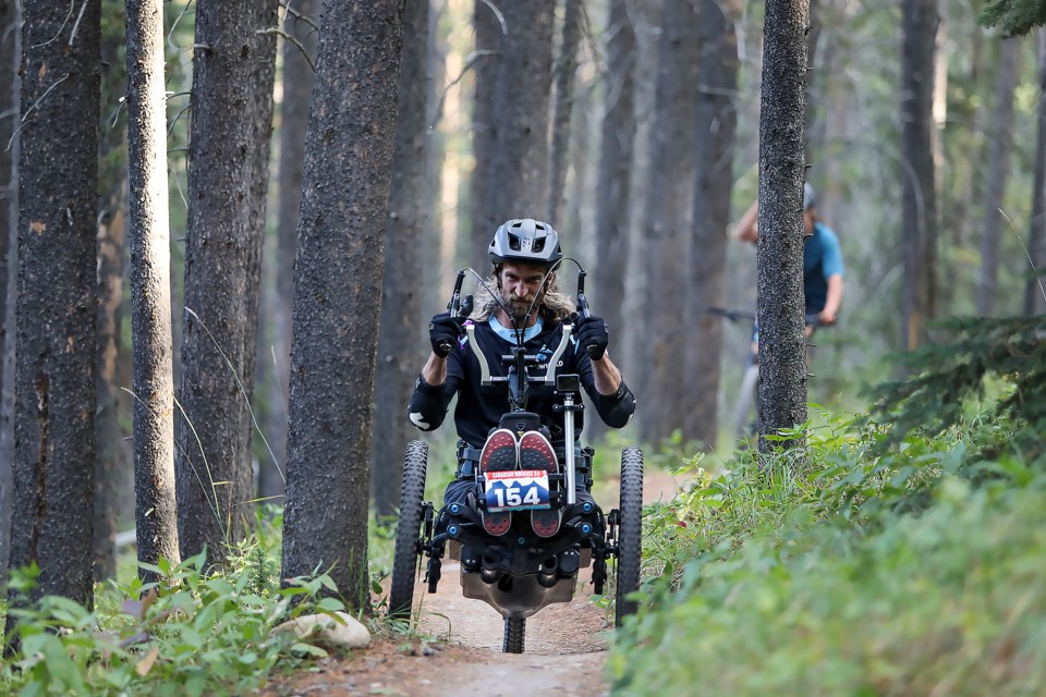 Team Bowhead’s Dave Sagal rides on the trail during the 24 hour mountain bike team race Canadian Rockies 24 on Saturday (Aug. 26) at the Canmore Nordic Centre. JUNGMIN HAM RMO PHOTO 