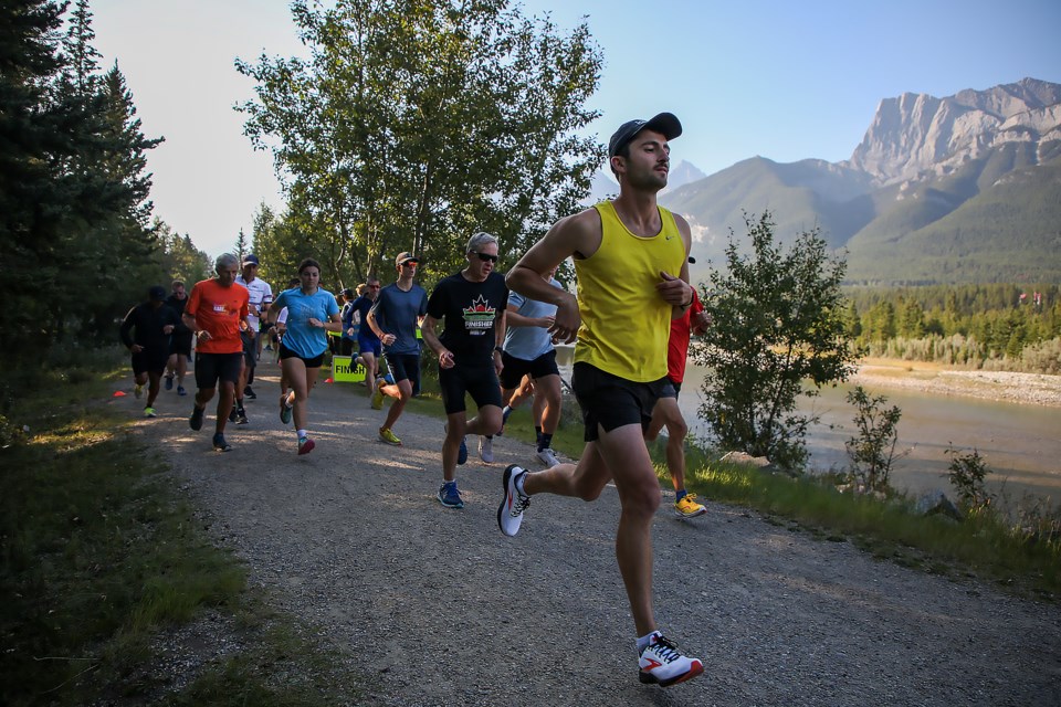 Runners race out of the starting line for the five-kilometre run at the Millennium Parkrun in Canmore on Saturday (Aug. 26). Millennium Parkrun takes place every Saturday at 9:00 a.m. JUNGMIN HAM RMO PHOTO 