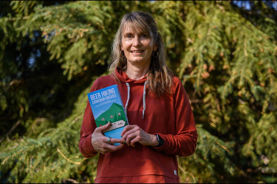 Banff author Kendall Hunter with her book, Beer Hiking: Canadian Rockies. MATTHEW THOMPSON RMO PHOTO