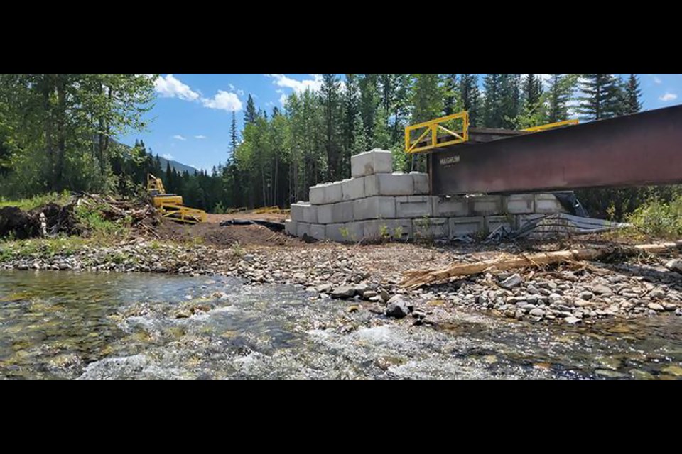 A bridge being built by Spray Lake Sawmills across the Highwood River to access logging operations in the Upper Highwood area of Kananaskis Country. 

PHOTO COURTESY OF CANADIAN PARKS AND WILDERNESS SOCIETY