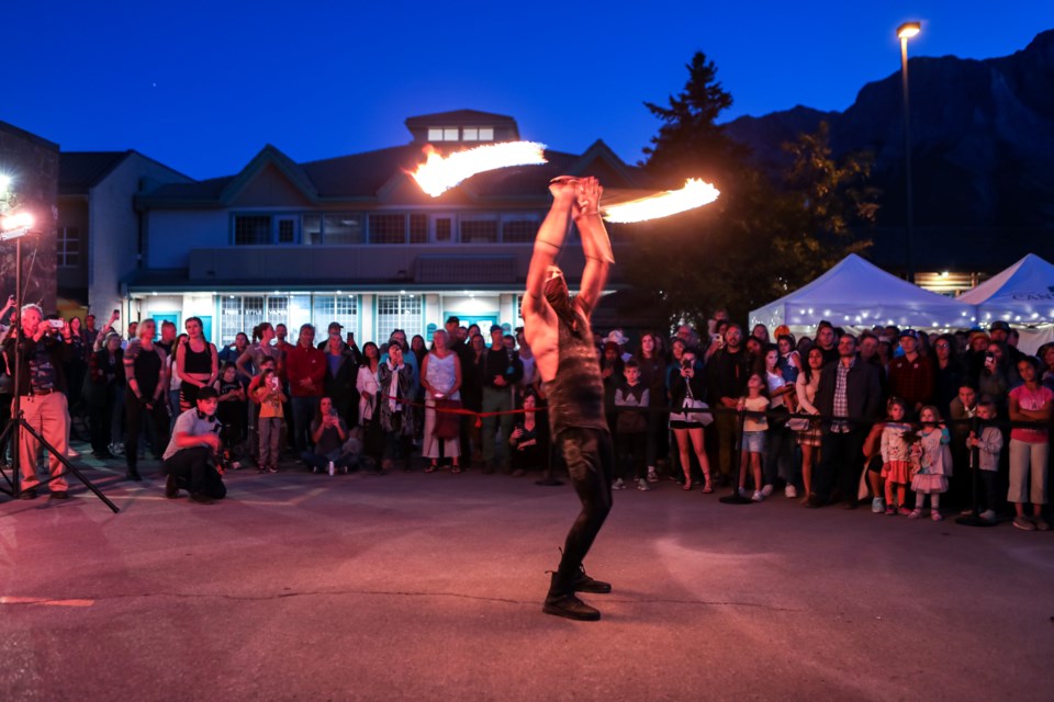 Beau Valley Circus' Theradiain performs fire spinning at the Outdoor Concert and Community Campfire at the Canmore Festival of Art and Creativity on Friday (Sept. 15). JUNGMIN HAM RMO PHOTO 