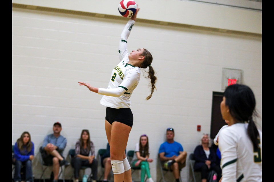 Tasmin Munro of the Canmore Wolverines girls team smashes the ball against the Bow Valley High School during the senior girls exhibition tournament at Canmore Collegiate High School on Saturday (Sept. 16). JUNGMIN HAM RMO PHOTO 
