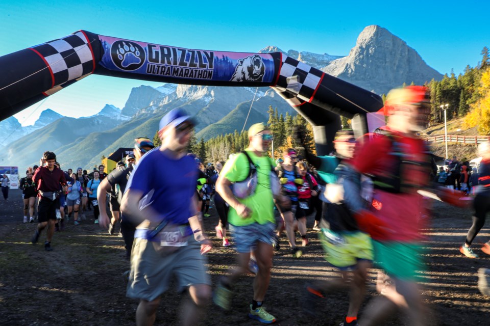 Racers run out of the gate at the 2023 Grizzly Ultra Marathon at the Canmore Nordic Centre on Saturday (Oct. 7). JUNGMIN HAM RMO PHOTO

