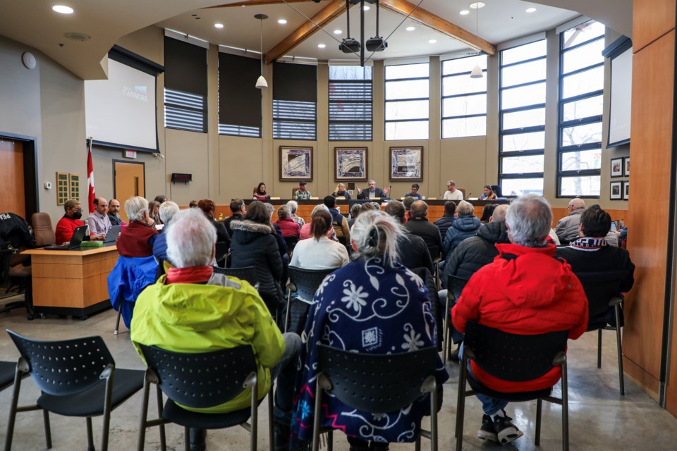 People listen to council prior to the adoption of the Three Sisters Village and Smith Creek area structure plans at Canmore council at Canmore Civic Centre on Tuesday (Oct. 24). JUNGMIN HAM RMO PHOTO 