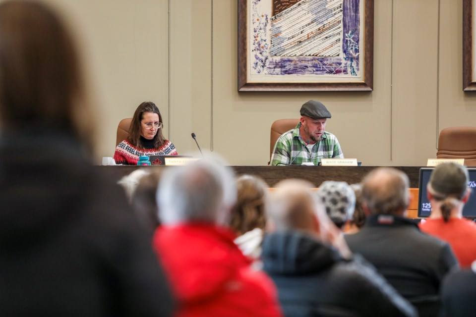 Coun. Wade Graham, right, speaks prior to a vote to adopt the Three Sisters Village area structure plans at Canmore council at Canmore Civic Centre on Tuesday (Oct. 24). JUNGMIN HAM RMO PHOTO 