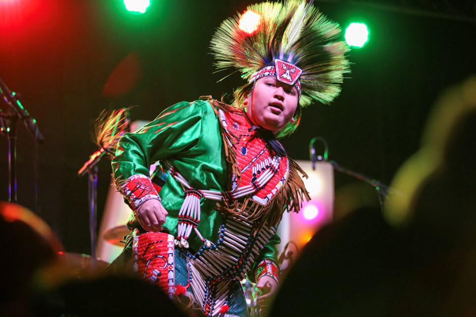 Smalleyes Camp's Harden Smalleyes performs on the main stage at the Santa Claus Celebration of Lights festive day at Banff Avenue on Saturday (Nov. 18). JUNGMIN HAM RMO PHOTO 