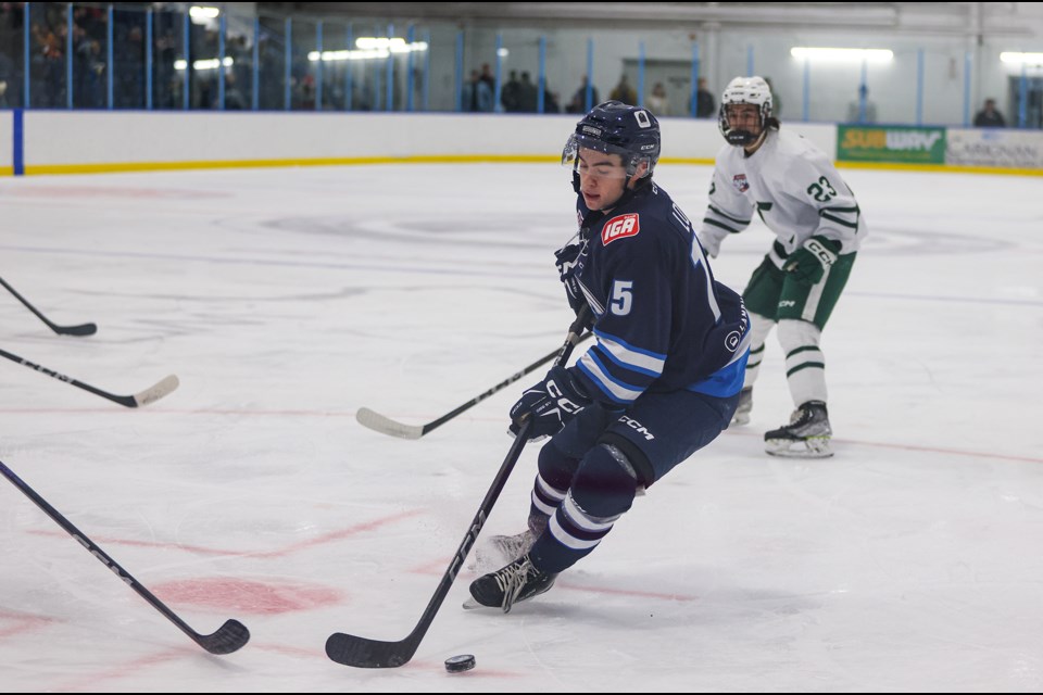 Canmore Eagles Ethan Look looks to take a pass against the Sherwood Park Crusaders at the Canmore Recreation Centre on Friday (Nov. 24). The Eagles won 7-4. JUNGMIN HAM RMO PHOTO