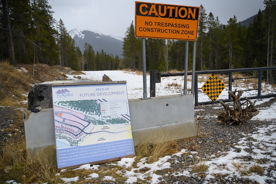A sign giving notice of further development in the Stewart Creek area of Three Sisters Mountain Village on Tuesday (Dec. 5). MATTHEW THOMPSON RMO PHOTO