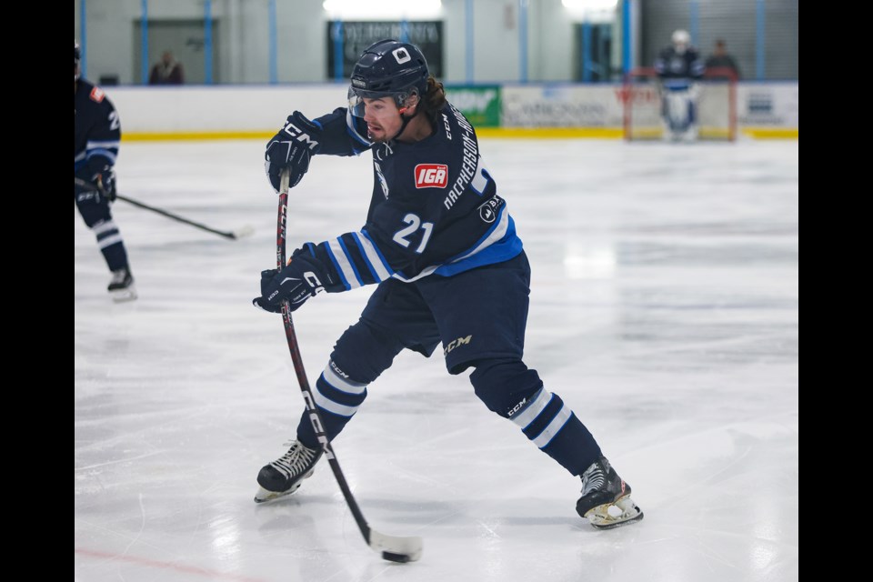 Canmore Eagles Nathan Macpherson-Ridgewell blasts a shot against the Brooks Bandits at the Canmore Recreation Centre on Tuesday (Dec. 12). The Eagles beat the Bandits 4-1. JUNGMIN HAM RMO PHOTO