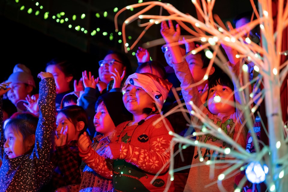 Grade 1 and Grade 2 classes' kids perform a carol song at Nakoda Elementary School (NES) 2023 Christmas concert in Mînî Thnî on Tuesday (Dec. 12). JUNGMIN HAM RMO PHOTO 