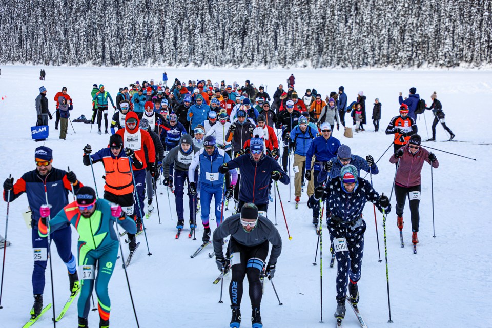 Skiers race off at the 2023 Lake Louise to Banff Loppet in January. JUNGMIN HAM RMO PHOTO 