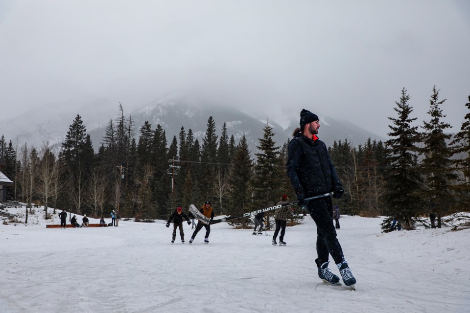 Winter lovers skate and play hockey at the Fenlands outdoor meadow rink in Banff on Saturday (Jan. 6). JUNGMIN HAM RMO PHOTO