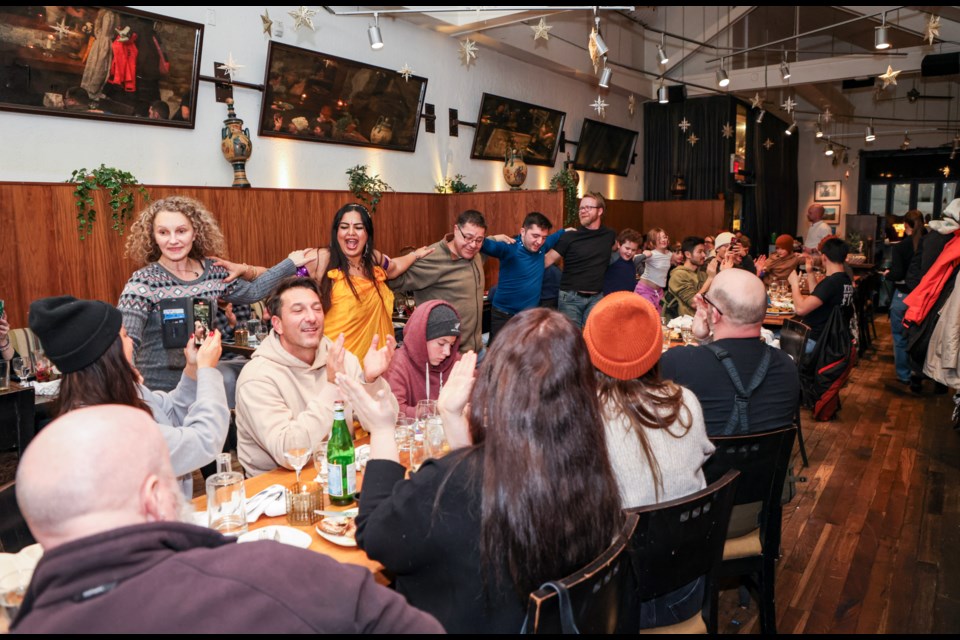 Performers and guests get up and perform the Greek Zorba dance during Greek Night at the Balkan Greek Restaurant in Banff on Thursday (Jan. 11). JUNGMIN HAM RMO PHOTO