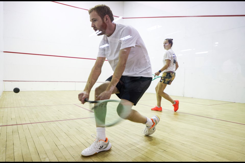 Graeme Schnell of the national squash team loads up a backhand drive during the 2024 Banff SaSquash Open at the Banff Rocky Mountain Resort on Friday (Jan. 12).  JUNGMIN HAM RMO PHOTO