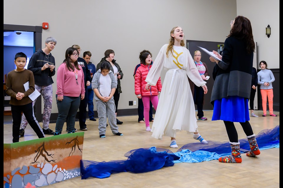 Director Candise McMullin, right, and student mentor Evanora Rodney, right centre, lead a crew of first-time actors in preparation for an upcoming performance in Canmore at Miners' Union Hall on Sunday (Jan. 21). MATTHEW THOMPSON RMO PHOTO