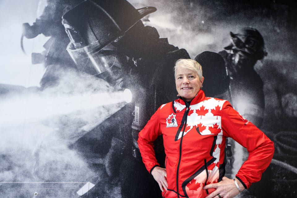 Canmore firefighter and masters biathlete Jacqueline Hutchison poses at the new fire hall in Canmore on Tuesday (Jan. 30). JUNGMIN HAM RMO PHOTO 