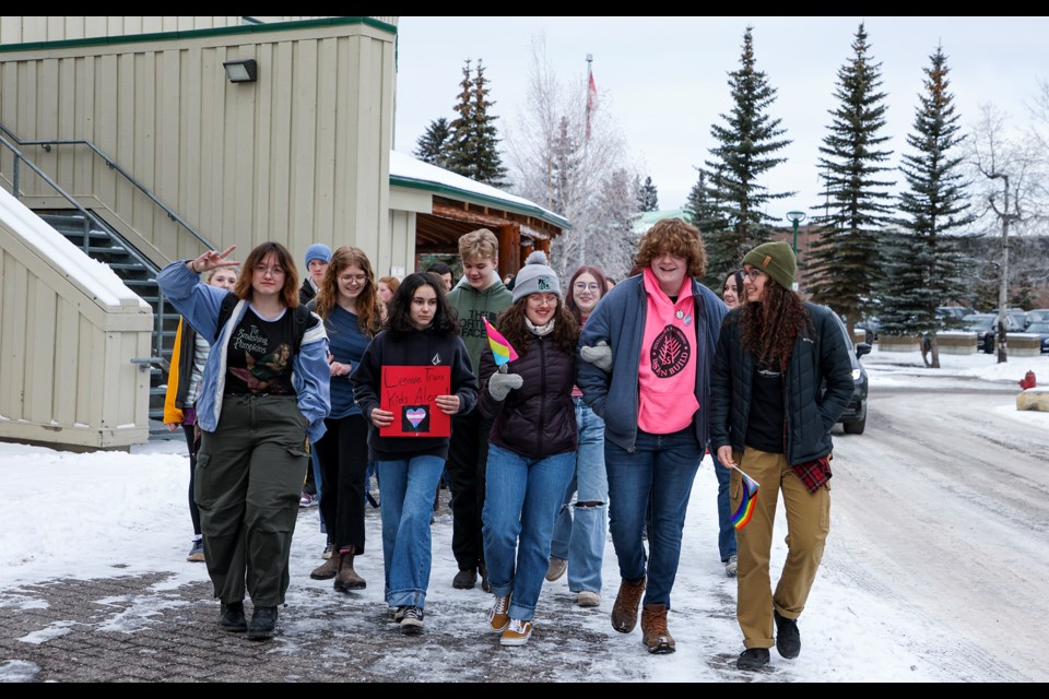 Canmore Collegiate High School Gender Sexuality Alliance (GSA) members and students participate in the Alberta-wide School walkout on Wednesday (Feb. 7) over the Alberta government’s planned policies around transgender youth after Premier Danielle Smith announced them on Thursday (Feb. 1). JUNGMIN HAM RMO PHOTO 