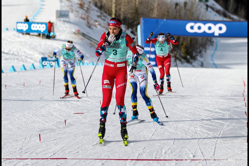 Norwegian Kristine Stavaas Skistad blows a kiss as she crosses the finish line in first place in the women’s sprint freestyle final at the 2024 COOP FIS Cross Country World Cup at the Canmore Nordic Centre on Saturday (Feb. 10). JUNGMIN HAM RMO PHOTO