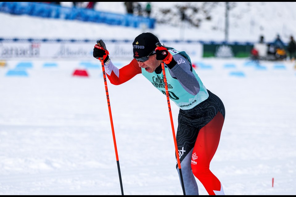 Canmore’s Xavier McKeever accelerates towards the finish line in the men’s sprint classic qualifications during the 2024 COOP FIS Cross Country World Cup at the Canmore Nordic Centre on Tuesday (Feb. 13). JUNGMIN HAM RMO PHOTO