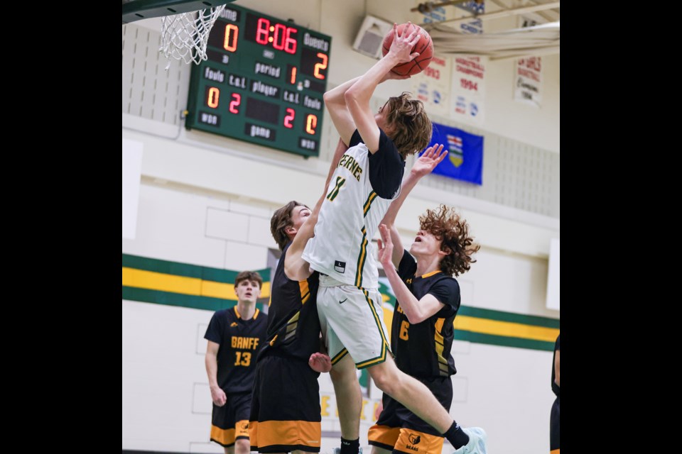 Canmore Wolverines Cody Oruski goes up for a shot against the Banff Bears at the Bow Valley basketball league at at Canmore Collegiate High School on Wednesday (Feb. 14). The Wolverines won 90-72. JUNGMIN HAM RMO PHOTO