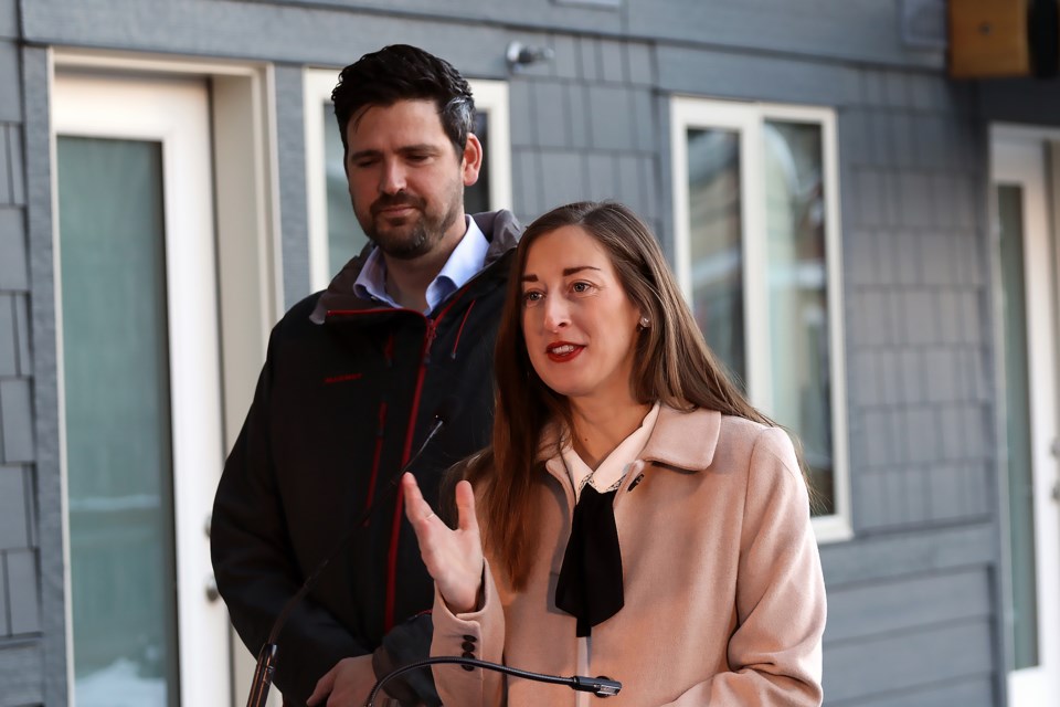 Banff Mayor Corrie DiManno, right, at the federal government’s announcement for Banff’s Housing Accelerator Fund application with Sean Fraser, the federal minister of housing, infrastructure and communities, left, listens to her left. The Town received $4.66 million to help its housing action plan. GREG COLGAN RMO PHOTO