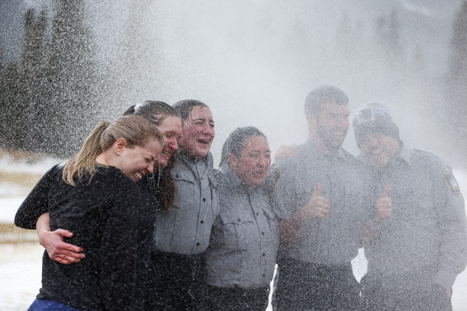 Canmore Municipal Enforcement staff are hit by cold water at the Polar Plunge at Millennium Park on Saturday (Feb. 24). From left: Taytam Lapointe, Caitlin Miller, Jaiden Hayward, Danielle Liwanag, Richard Barnes and Greg Burt. JUNGMIN HAM RMO PHOTO 