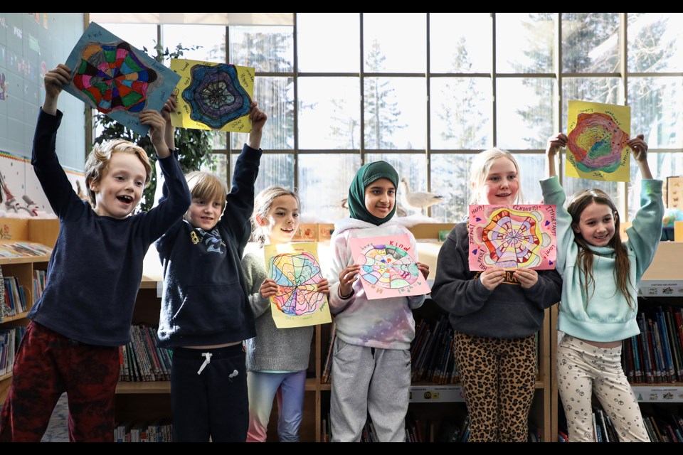 Grade 3 students shared their thoughts on kindness while creating original ripple paintings at the "Right From the HeART" program at Elizabeth Rummel Public School in Canmore on Tuesday (Feb. 27). From left: Toby Walker, Angus Allan, Paige Mah, Khursdand Fatemah, Maya Ariss and Lila Page.  JUNGMIN HAM RMO PHOTO