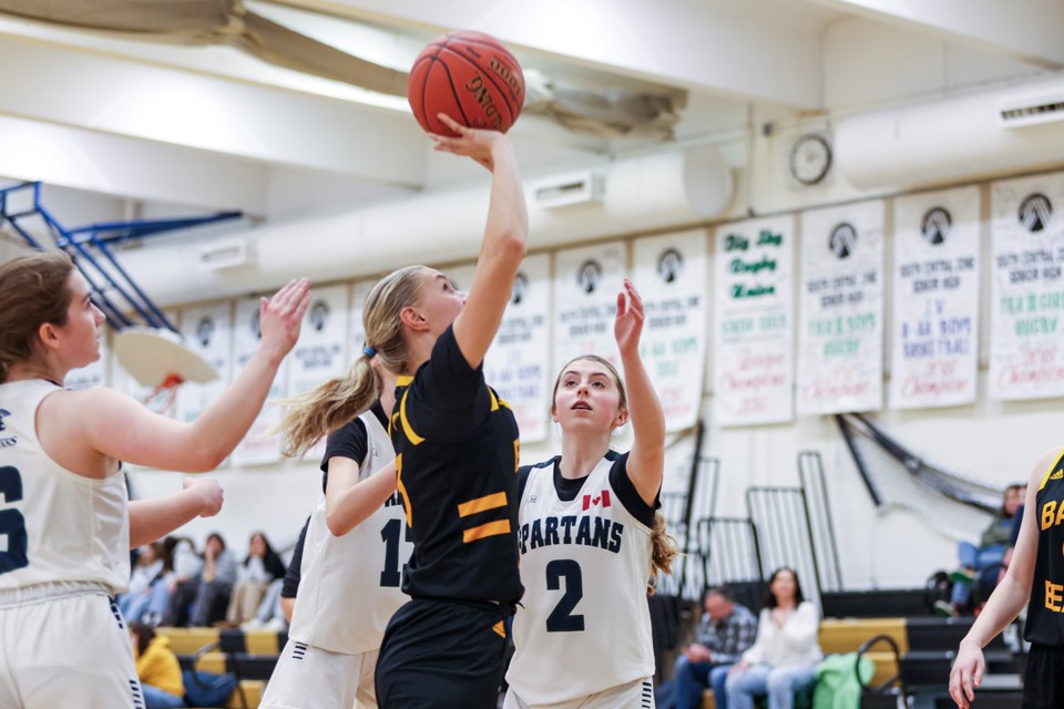 Banff Bears Sophie Sibbald goes up for a push shot against the Strathcona-Tweedsmuir Spartans during the Bears Classic senior girls basketball tournament at Banff Community High School on Friday (March 1). The Bears won 47-27. JUNGMIN HAM RMO PHOTO