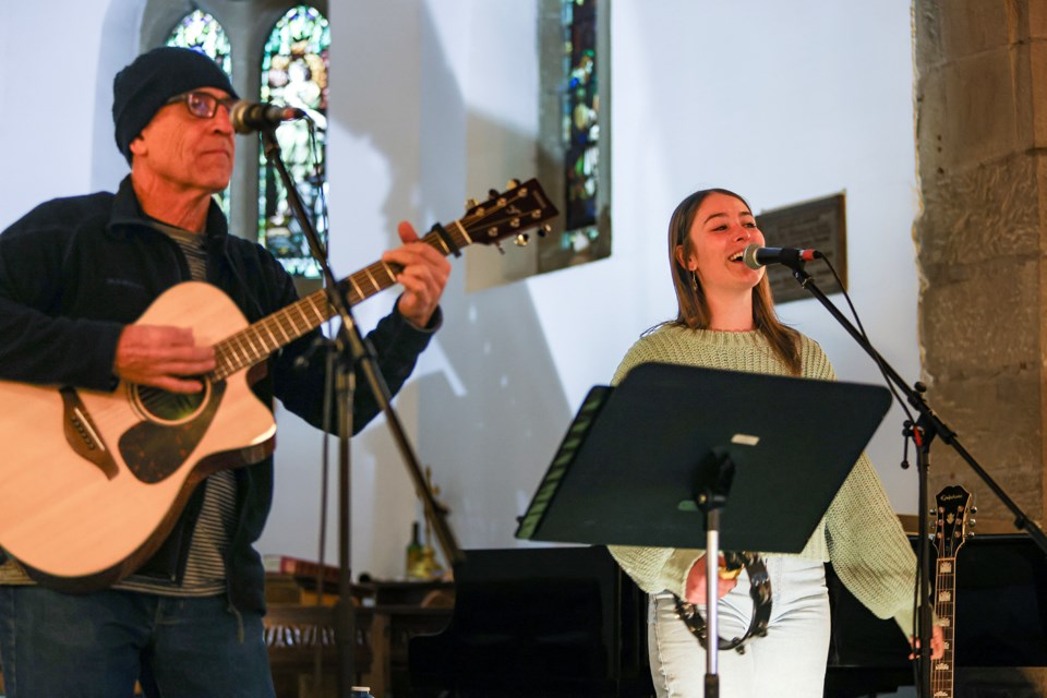 Tommy's Unplugged 2023 winner Carly Mackerras, right, and dad Roo Mackerras perform on stage at the Community Coffeehouse at St. George's in the Pines Anglican Church in Banff on Thursday (March 7). JUNGMIN HAM RMO PHOTO 