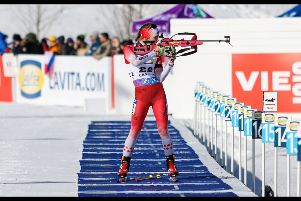 Canada's Emma Lunder shoots on the range during the women's 7.5-km sprint at the IBU Biathlon World Cup 2024 at the Canmore Nordic Centre on Thursday (March 14). JUNGMIN HAM RMO PHOTO