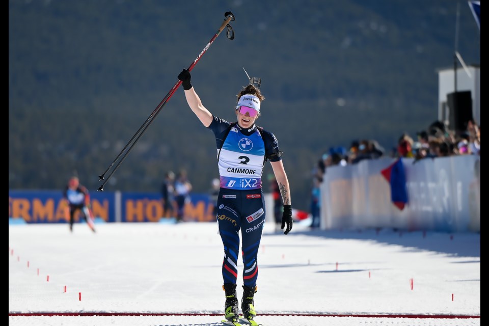 Lou Jeanmonnot of France crosses the finish line in first place in the women's 12.5 km mass start at the 2024 IBU Biathlon World Cup at the Canmore Nordic Centre on Sunday (March 17). MATTHEW THOMPSON RMO PHOTO