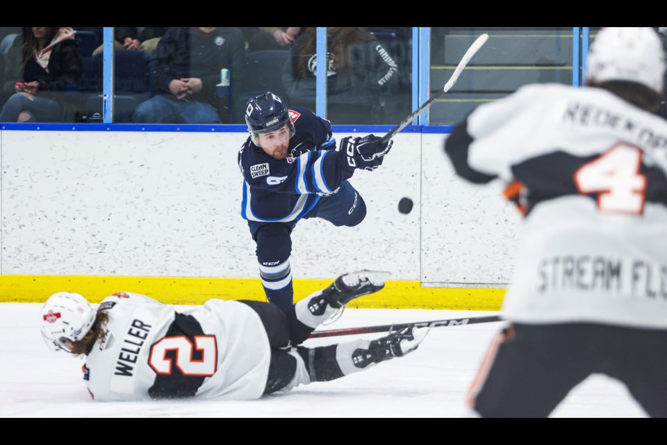 Canmore Eagles forward Rhett Dekowny blasts a shot on net against the Lloydminster Bobcats during the Game 3 of the AJHL playoffs at the Canmore Recreation Centre on Tuesday (March 19). The Eagles won 4-3. JUNGMIN HAM RMO PHOTO 